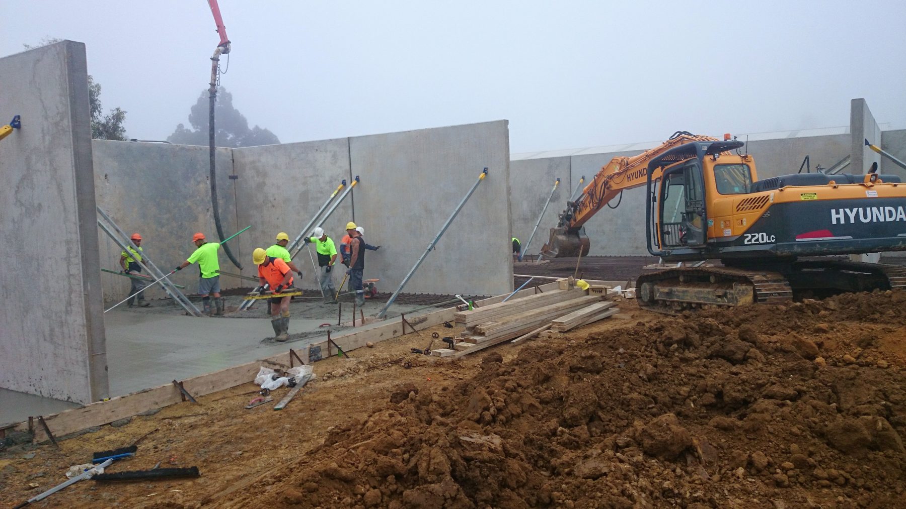 Emu Plains works with excavator and crew